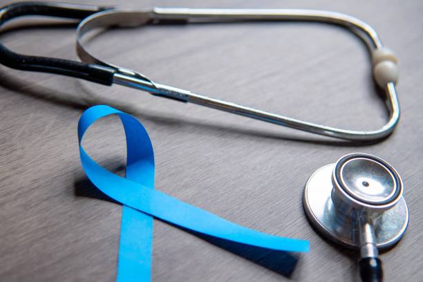 istock A blue ribbon and a stethoscope placed on a wooden surface. 2176118457