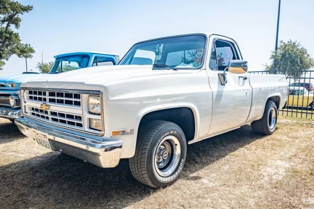 Gulfport, MS - October 03, 2023: Low perspective front corner view of a 1983 Chevrolet C10 Pickup Truck at a local car show.