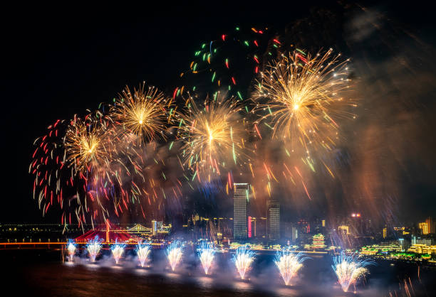 istock Fireworks at night beautiful blooming fireworks 2176122218