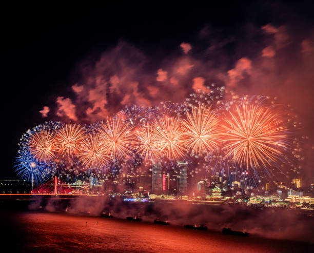 istock Fireworks at night beautiful blooming fireworks 2176122383