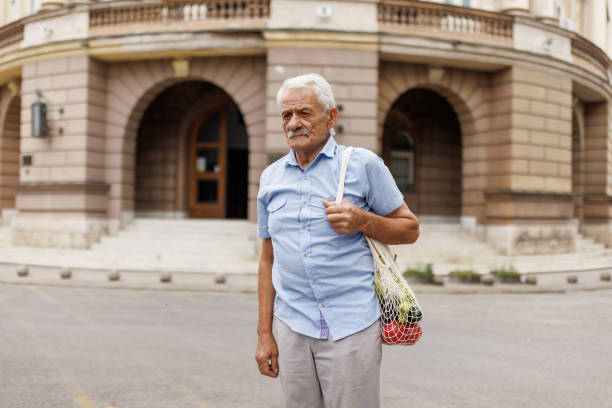 istock Senior man returning home from farmer's market 2176122632