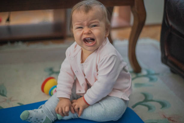 istock A little baby girl is crying 2176126801