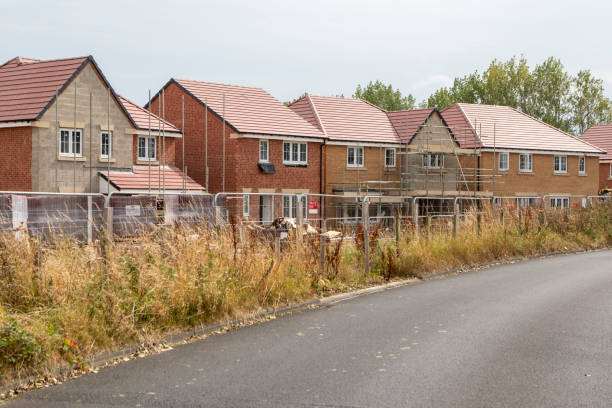 istock Nearly completed new houses in a row 2176130125