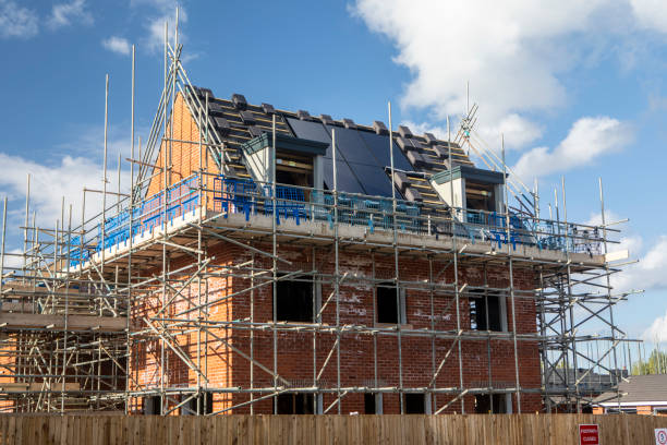 istock A new house under construction and surrounded in scaffolding 2176130320