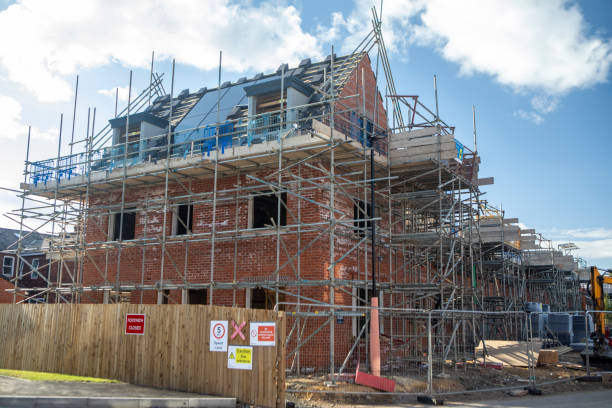 istock A new house under construction and surrounded in scaffolding 2176130591