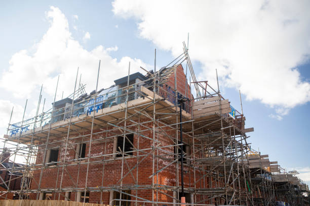 istock A new house under construction and surrounded in scaffolding 2176130901