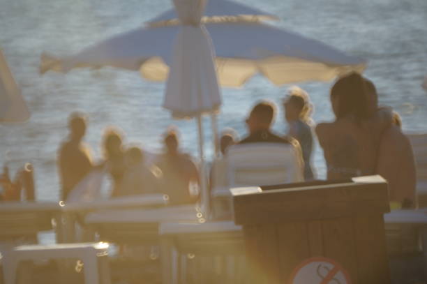 istock Blurred background. People are relaxing on the beach. 2176131395