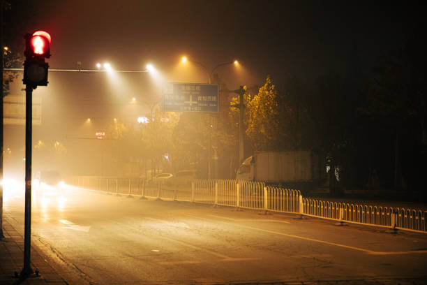 Yellow smog and environmental pollution in the city at night