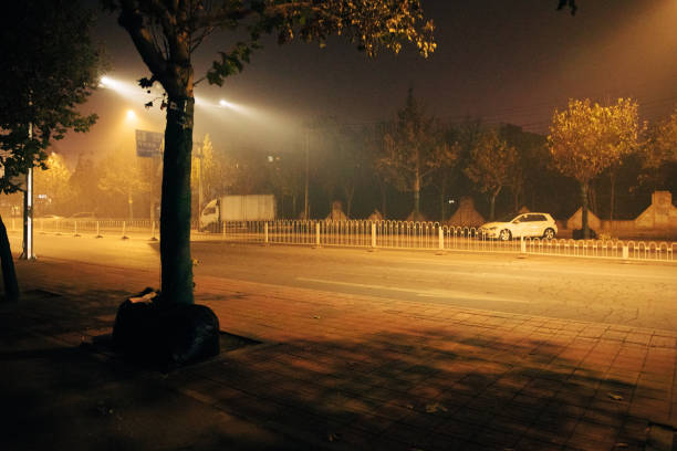 Yellow smog and environmental pollution in the city at night