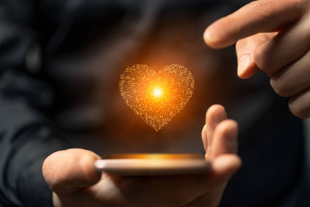 istock Artificial intelligence heart symbol on a smartphone held by a man 2176162574
