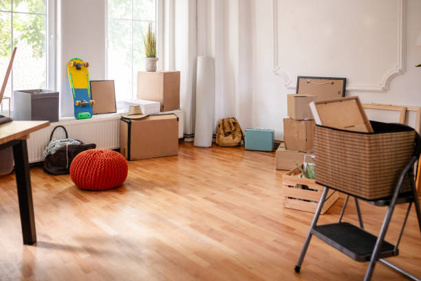 istock Cozy Room with Moving Boxes and Skateboard Display 2176162898