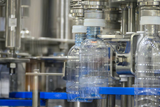 istock The  empty drinking water bottles  on the conveyor belt for filling process. 2176168983