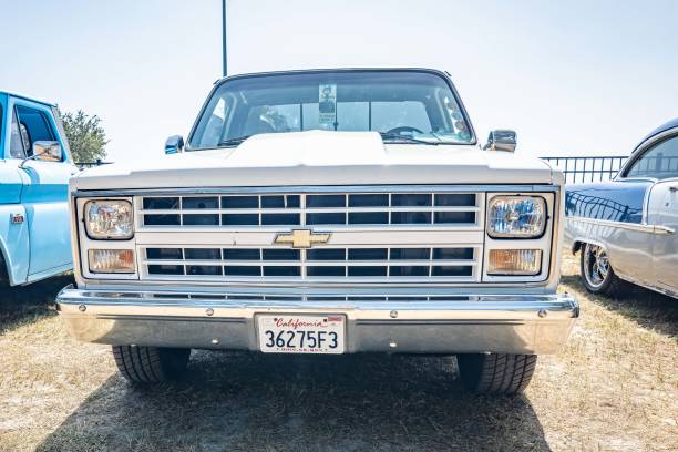 Gulfport, MS - October 03, 2023: Low perspective front view of a 1983 Chevrolet C10 Pickup Truck at a local car show.
