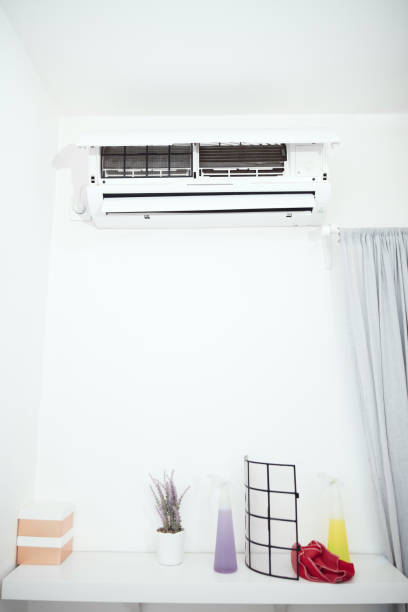 istock Cleaning and maintaining air condition unit at home. 2176178283