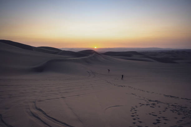 istock Sand dunes in Huacachina at sunset 2176180609