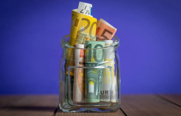 istock Euro Banknotes in a Glass Jar 2176185102
