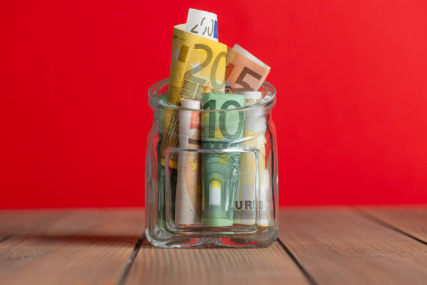 istock Euro Banknotes in a Glass Jar 2176185246