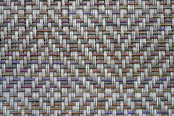 A interesting macro image of the plastic fabric of a cheaper piece patio furniture.