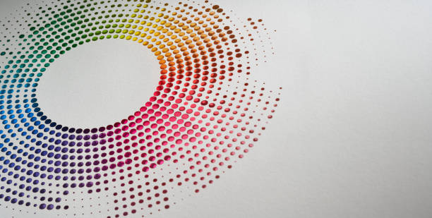 istock Vibrant circular paper artwork featuring a rainbow of colors in a precise dot gradient design 2176192282