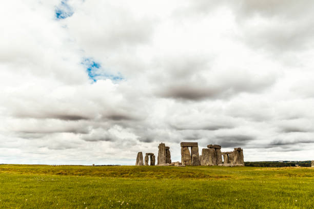 Ancient Stonehenge in England under cloudy overcast sky