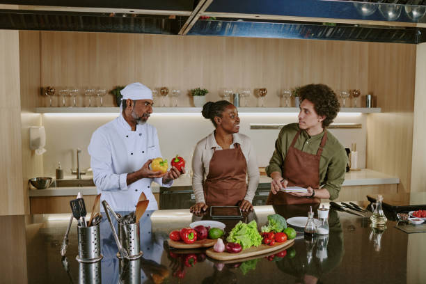 istock Team of Chef Preparing Ingredients 2176195313