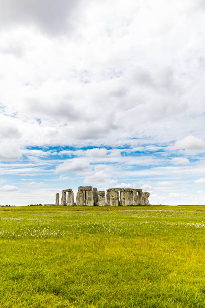 Ancient Stonehenge in England under cloudy overcast sky