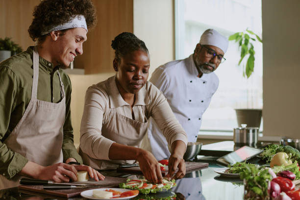 istock Female Cook Decorating Caprese 2176196829