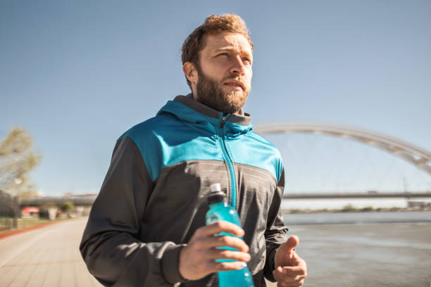 istock Jogging Near the River 2176196965