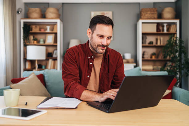 istock Happy businessman working at office 2176198474