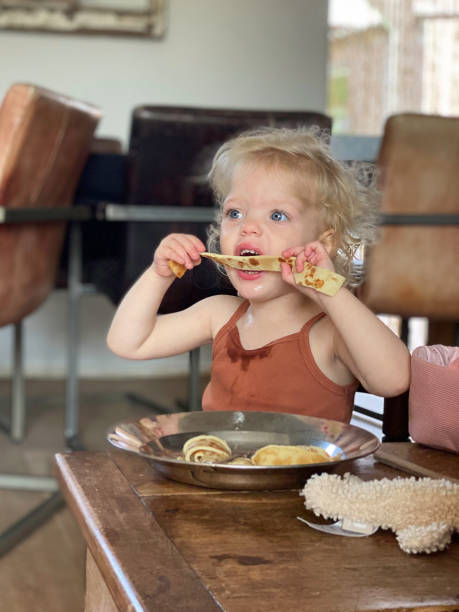istock Pancake eating Toddler Girl 2176202320