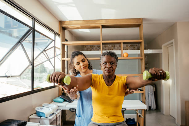 istock Elderly woman doing physical therapy with dumbbells 2176208204
