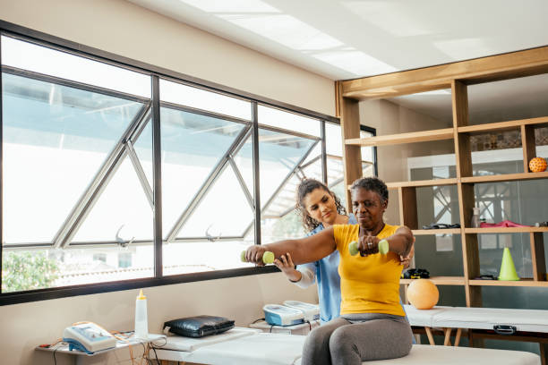 istock Elderly woman doing physical therapy with dumbbells 2176208398