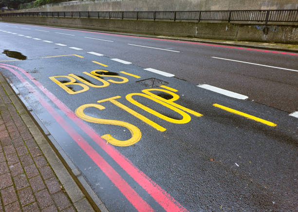 istock Yellow bus stop sign painted on the floor 2176213015