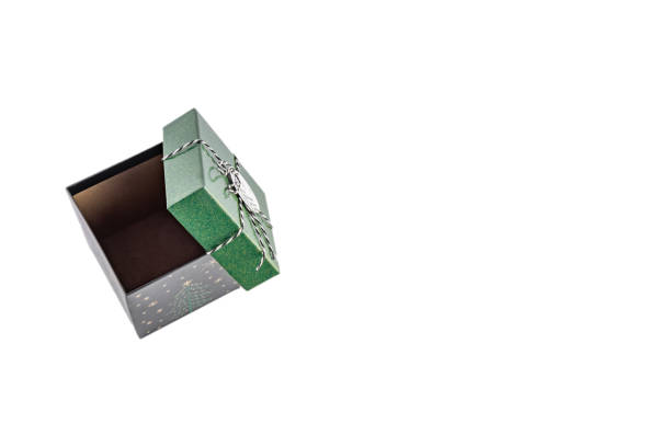 Packing gifts for Christmas, for a birthday, for a name day, for a loved one, for a wife, for a mother, for a lover, for a husband, for a boyfriend, green decorative box with an opening lid