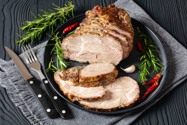 istock Roast Pork Neck sliced on a plate, top view 2176219144
