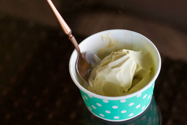 istock Pistachio ice cream in a cup 2176225492
