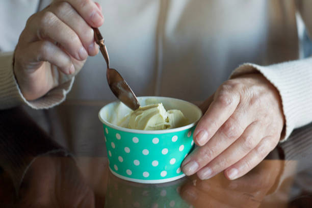 istock Pistachio ice cream in a cup 2176225500