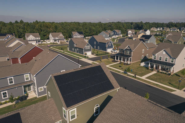 istock Green House with Solar Panels - Modern Middle Class Neighborhood - Dense Population 2176228105