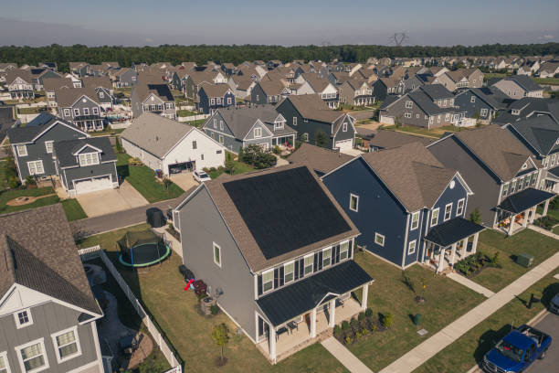 istock Grey House with Solar Panels - Modern Middle Class Neighborhood - Dense Population 2176228267