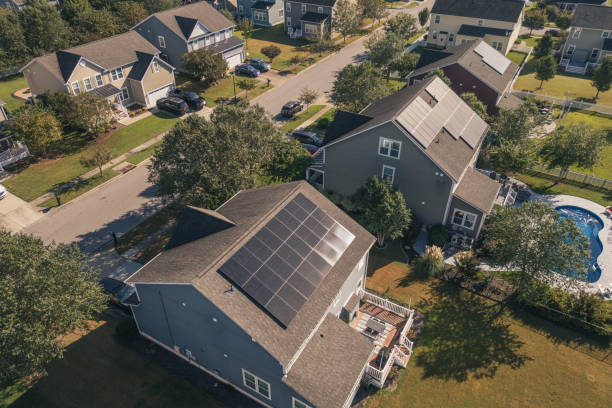 istock Solar Houses in a Row with Pool- Modern Middle Class Neighborhood - Dense Population - High Angle 2176228532