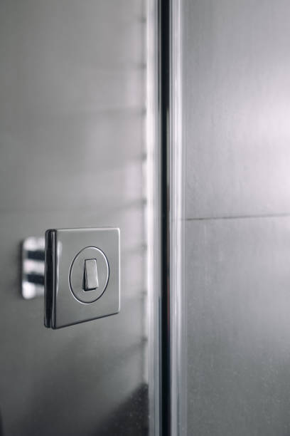 istock Elegant silver light switch on a modern wall in a minimalist interior 2176236544