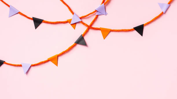 istock Halloween bunting flag garland on pink background 2176238873