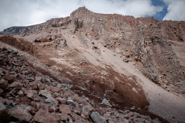 The interplay of ice and rock creates a harmonious composition of contrasting elements.