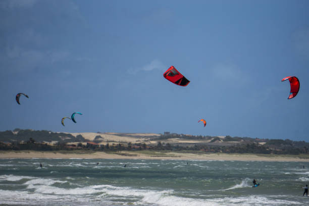 istock people kitesurfing on a windy day 2176248007