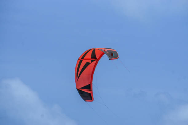 people kitesurfing on a windy day