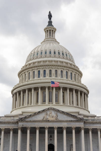 istock United States Capitol under cloudy skies 2176250685