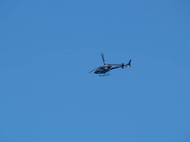 Sacramento, California, United States - March 12, 2009: Blue News Helicopter Flying In Clear Sky