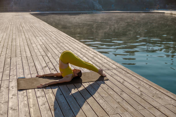 istock Engaging in a Yoga Practice by the Water Enhancing Flexibility and Finding Inner Serenity 2176254704