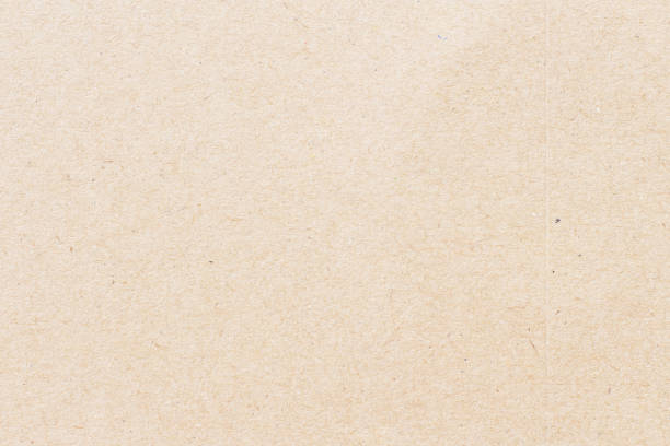 istock paper background texture light rough textured spotted blank copy space background in yellow,brown 2176257667
