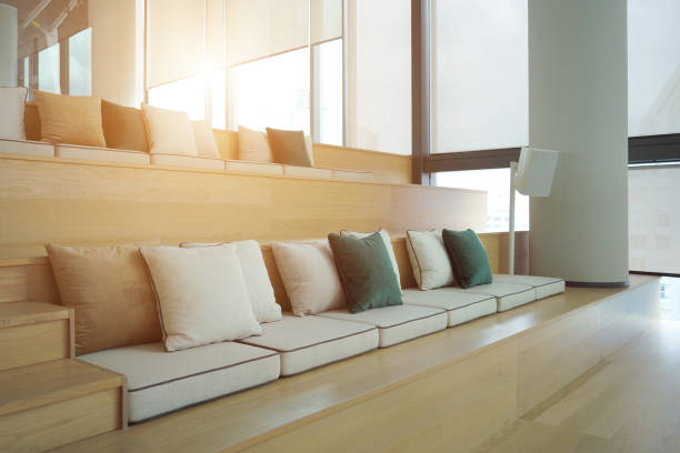 A multi-purpose room within the hotel decorated with sofas, Pillows and cushions. Use it for relaxing, watching movies, listening to music, and reading books.